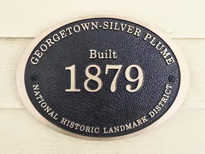 a plaque that reads built on a wall at Historic 4 bedroom Victorian Home in Downtown Georgetown in Georgetown