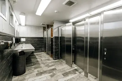 a bathroom with two sinks and a shower at Colorado Glamping Adventures in Golden Gate Canyon Park, in this Cute Cabin Rental in Black Hawk