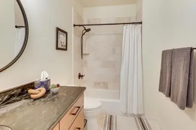 a bathroom with a shower and a toilet and a sink at Walk to Ski Lift Granby Ranch Family Retreat! in Granby