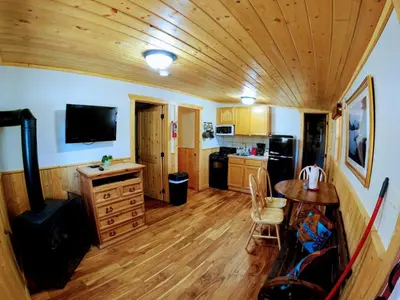 a large room with a kitchen and a dining room at Arapaho in Grand Lake