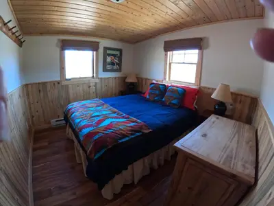 a bedroom with a bed in a small room at Shadow Mountain in Grand Lake