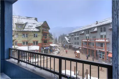 a view from a balcony of a street with buildings at Fantastic Mountain Home Near Ski Lifts condo in Keystone