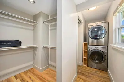 a laundry room with a washer and dryer at Magnolia Hideaway Pet Friendly with Fireplace in Fort Collins