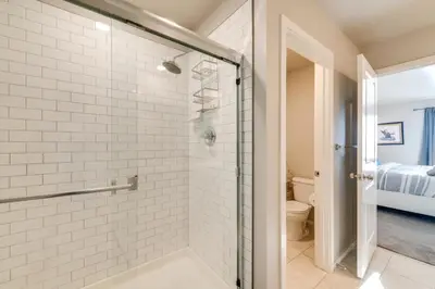 a bathroom with a shower and a toilet at 11 Mi to Fort Collins Wellington Retreat with Patio in Wellington