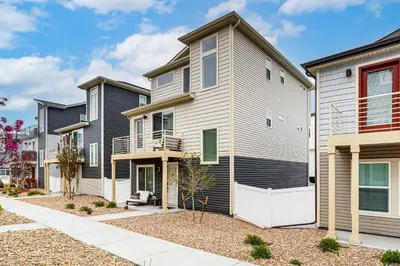 a row of houses in a neighborhood at 13 Mi to Dtwn Denver Spacious Home with Balcony! in Denver