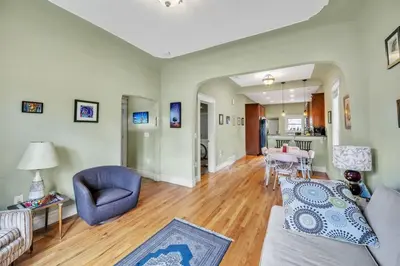 a living room with a couch and chairs and a table at Stylish 2-Story Home - Perfect Denver Location home in Denver
