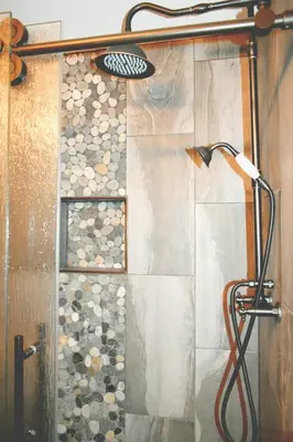a shower with a shower head in a bathroom at Blackhawk in Grand Lake