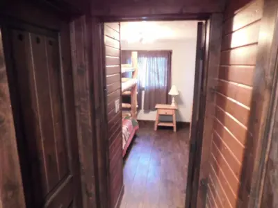 an open door to a room with a bedroom at Blackhawk in Grand Lake
