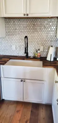 a kitchen with a white sink in a kitchen at Cowboy cabin in Grand Lake