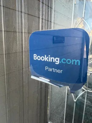 a blue box is hanging on a window at DIA Layover B&B in DEN
