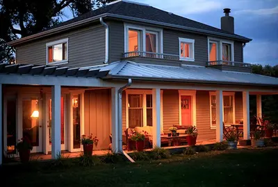 a house with a front porch with a patio at Gorgeous Ranch Stay Accommodation with Amazing Views in Livermore, Colorado in Livermore