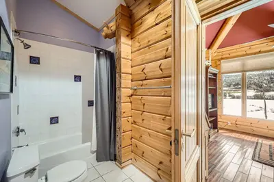 a bathroom with a shower and a toilet at 3BDR with Loft for 8 Hot Tub Sauna & Mtn Views in Breckenridge