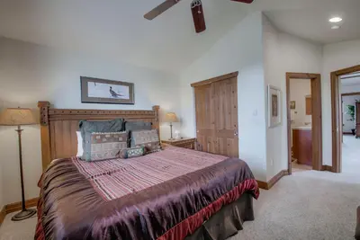 a bedroom with a large bed in a room at Spacious 4BR Near Trails with Shuttle to Slopes in Breckenridge