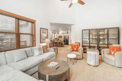 a living room with a couch and chairs and a table at 3 BDR for 10 with Pool & Hot Tub Mins to Ski Lift in Dillon