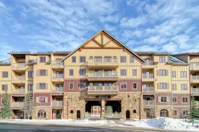 a large apartment building with a large building at 3 BDR for 10 with Pool & Hot Tub Mins to Ski Lift in Dillon