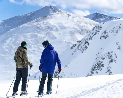 two people on skis on a snow covered mountain at Perfect Getaway Cabin with Nearby Hike&Bike Trails in Breckenridge