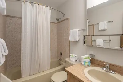 a bathroom with a sink and a toilet and a shower at Meadow Ridge Court 31 Unit 4 in Fraser