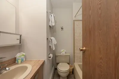 a bathroom with a toilet and a sink at Meadow Ridge Court 31 Unit 4 in Fraser