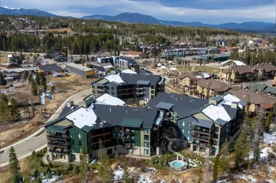 an aerial view of a resort town with snow covered roofs at Timber Fox Building B Unit 2102 in Winter Park