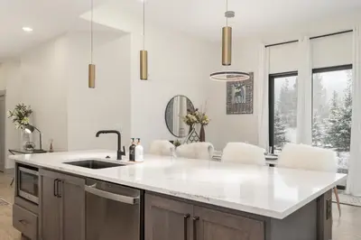 a kitchen with a sink and a counter top at Timber Fox Building B Unit 2102 in Winter Park