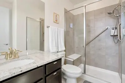 a bathroom with a sink and a toilet and a shower at Spacious Luxury Retreat Near Boulder & Denver in Superior