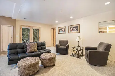 a living room with a couch and two chairs at Cedar Ridge Sanctuary Rocky Mtn Natl Park in Lyons