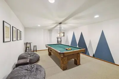 a room with a pool table and two chairs at Pet-Friendly 3 Bedroom Townhome In Frisco - Short Drive To Breck! in Frisco