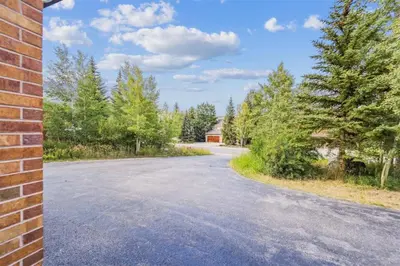 an empty road with a building in the distance at Pet-Friendly 3 Bedroom Townhome In Frisco - Short Drive To Breck! in Frisco