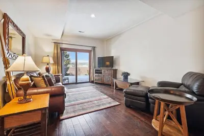 a living room with a couch and a table at Pet-Friendly 4 Bedroom Townhome In Frisco - Short Drive To Breck! in Frisco