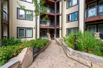 a building with a brick walkway in front of it at Founders Pointe 4355 Ski In Ski Out Winter Park Resort in Winter Park