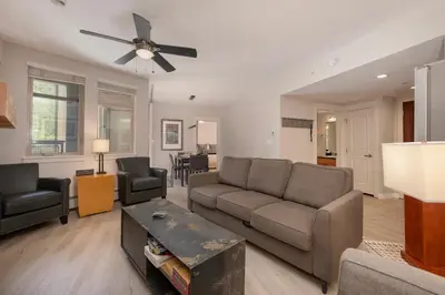 a living room with a couch and a ceiling fan at Founders Pointe 4355 Ski In Ski Out Winter Park Resort in Winter Park