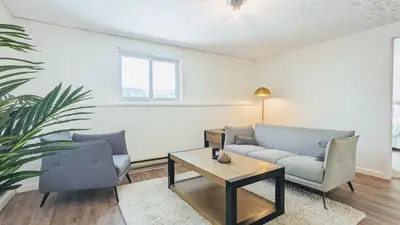 a living room with a couch and two chairs and a table at Beautiful Monthly 1BR Near NREL & Trails - Quaker Room 3 in Golden