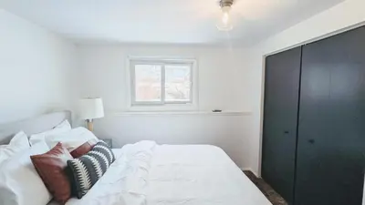 a bedroom with a white bed and a window at Beautiful Monthly 1BR Near NREL & Trails - Quaker Room 3 in Golden