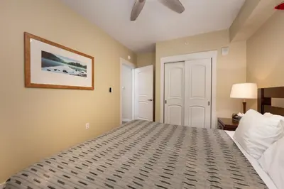 a bedroom with a bed and a ceiling fan at Fraser Crossing 3423 Ski In Ski Out Winter Park Resort in Winter Park