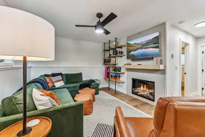 a living room with a couch and a fireplace at 249 E Coyote in Silverthorne