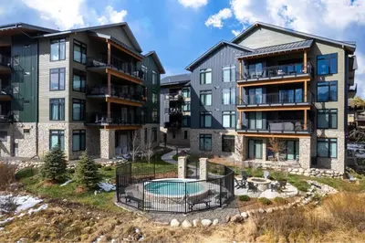 an image of an apartment complex with a pool at Timber Fox 3309 Downtown Condo - Beautiful Fireplace in Winter Park