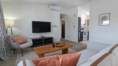 a living room with a couch and a table at Charming 1BR Close to Trails & NREL Monthly Rental - Quaker Room 2 in Golden
