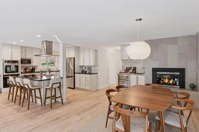 a kitchen and dining room with a table and chairs at 1010 Rosehill Dr in Boulder