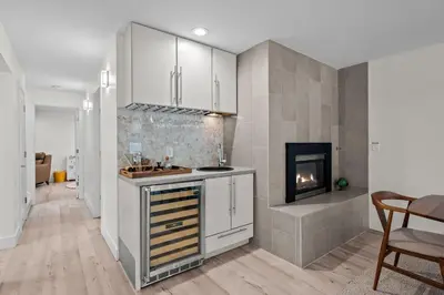 a kitchen with a stove and a fireplace at 1010 Rosehill Dr in Boulder