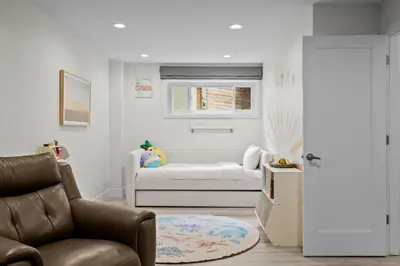 a living room with a couch and a bed at 1010 Rosehill Dr in Boulder
