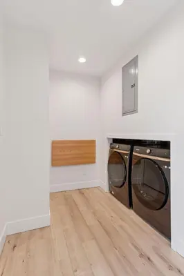 a laundry room with a washer and dryer at 1010 Rosehill Dr in Boulder