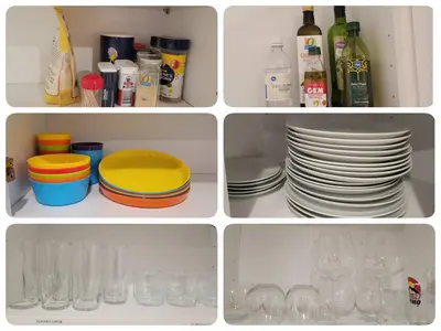 a refrigerator filled with dishes and plates and wine bottles at Mid Summer Night's Dream w/HotTub&Theater in Arvada
