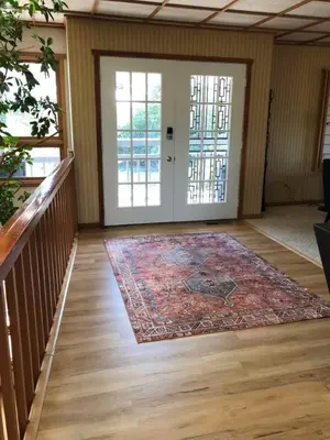 an empty room with a door and a rug at Unique Home 40 acres Peaceful Near Boulder 2 Dogs OK in Longmont