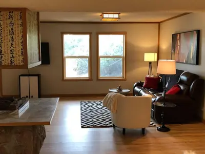 a living room with a couch and a chair at Unique Home 40 acres Peaceful Near Boulder 2 Dogs OK in Longmont
