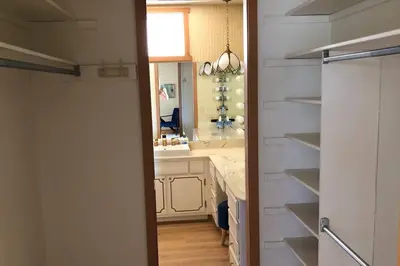 a bathroom with a sink and a mirror at Unique Home 40 acres Peaceful Near Boulder 2 Dogs OK in Longmont