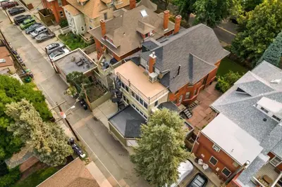 an overhead view of a house with a roof at Historic Cap Hill Gem Prime Location Walkable in Denver