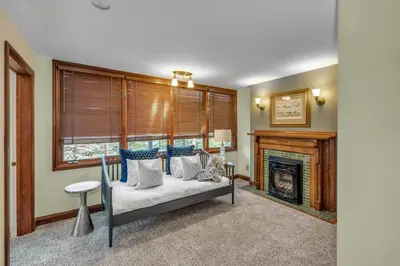 a living room with a couch and a fireplace at Historic Cap Hill Gem Prime Location Walkable in Denver
