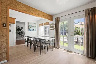 a dining room with a table and chairs at Heated Pool BBQ Cabana Gardens in Denver