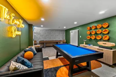a ping pong room with a ping pong table at Theater, Hot Tub, Mini Golf, Luxe Fun House in Centennial