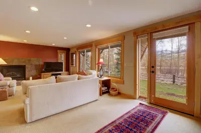 a living room with a couch and a fireplace at 1250 Willow Grove townhouse in Silverthorne